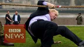 Boris Johnson takes a tumble in tug of war with armed forces - BBC News