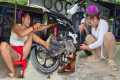 Girl buys motorbike from junkyard,